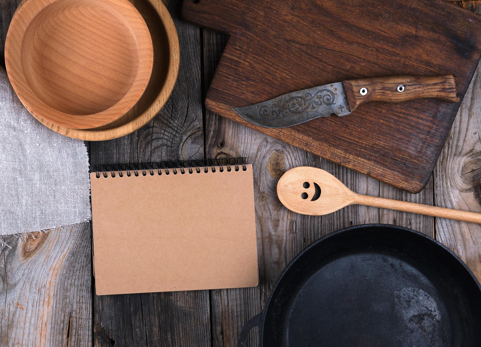 Course materials and plated examples on a wooden table
